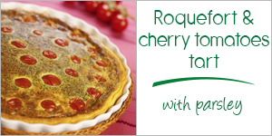 Roquefort tart with cherry tomatoes and parsley